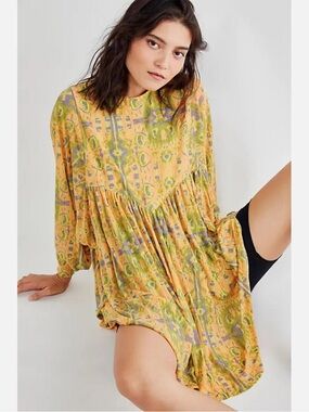 Free People "This Is It" oversized long-sleeve tunic top.